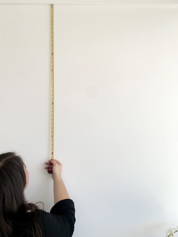 Peel and stick wallpaper installation. 